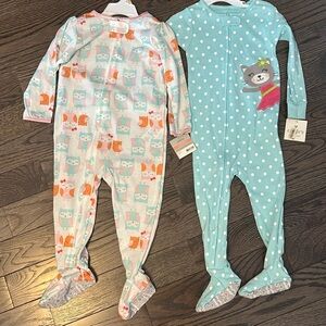 Lot of 2T Carter’s long sleeve footed pajamas both new with tags